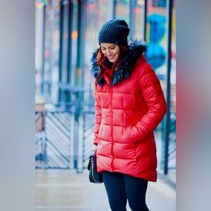 The North Face Women's Red Puffer Coat with Black Fur Trim